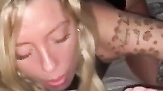 Interracial dick sucking in bed with a decent blonde