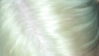 Platinum blonde sucking penis on camera